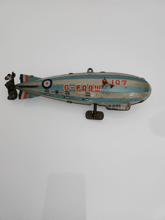 Scarce, Japanese Pre WW2 Tinplate Mechanical Flying Toy of The Royal Airship Works R-107(K.K Japan) 1930s Japan